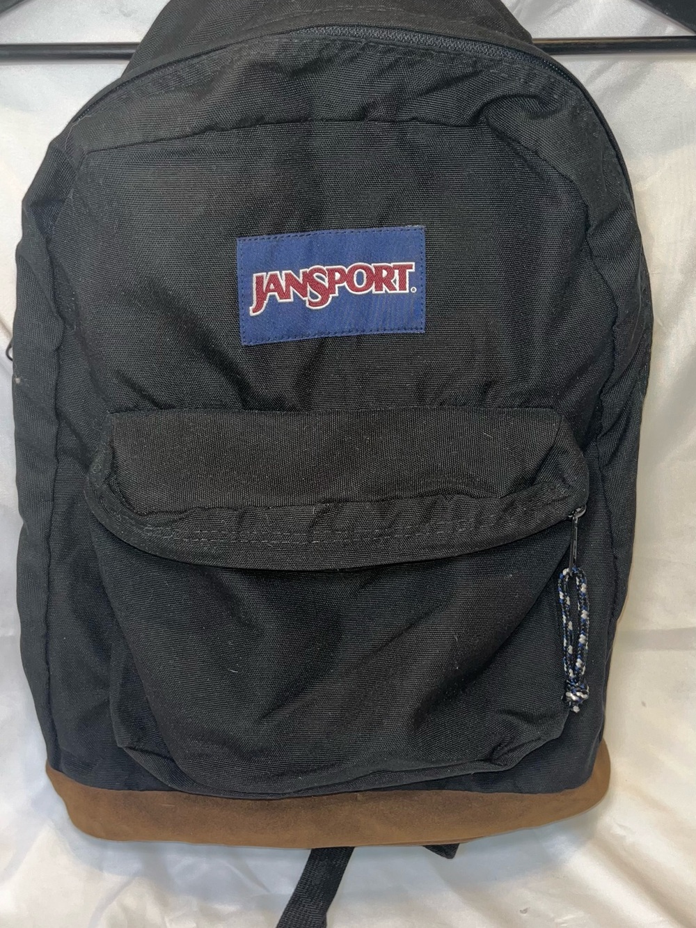 Jansport Black Backpack with Brown Base and Navy Logo